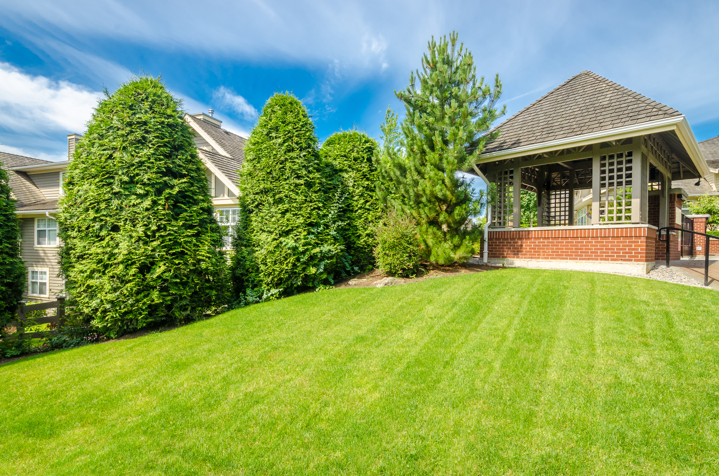 Well-maintained St. Augustine lawn surrounding a Florida home needing weed control Lakeland FL